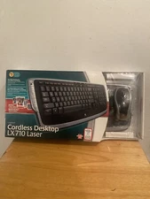 Logitech Cordless Desktop LX710 Laser Keyboard and Mouse 967670-0403 NEW open