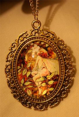 Lovely Swirled Goldtone Delightful Pixie Fairy Frolicking in the Leaves Necklace