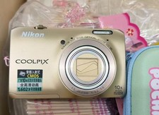 Nikon COOLPIX S6300 16.0 MP 10x Optical Zoom Digital Camera Gold English
