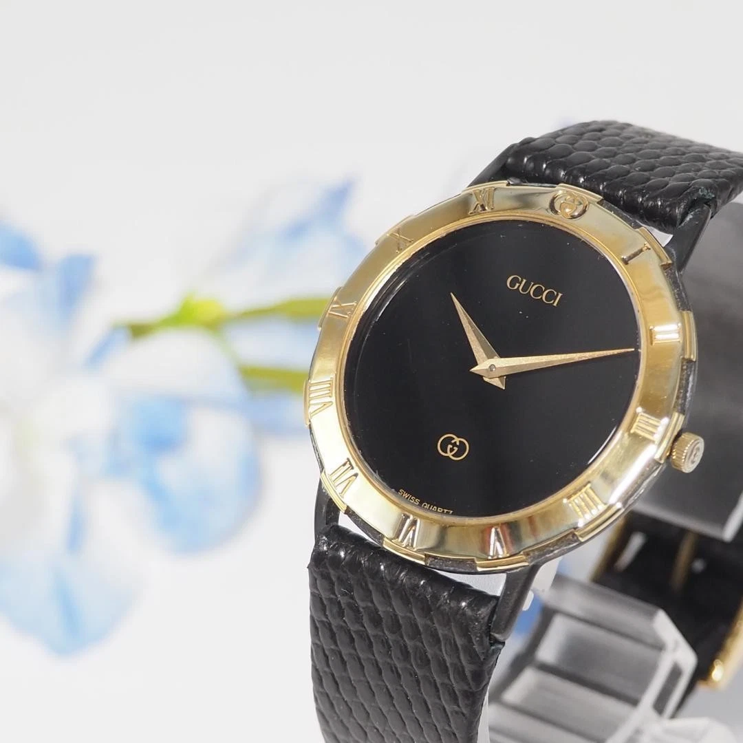 Montre homme Gucci romaine ceinture cuir F182