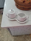 Fiestaware Sugar Bowl with Lid and Creamer On a Tray