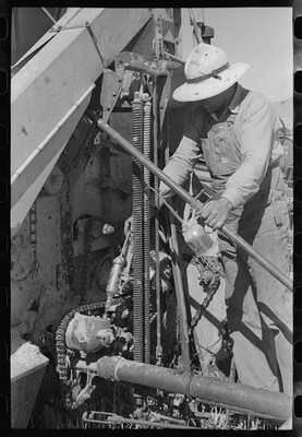 Photo:Box Elder County Utah 1940 FSA Man Greasing Farm Machinery
