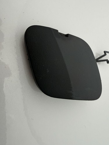 Rear tow hook cover