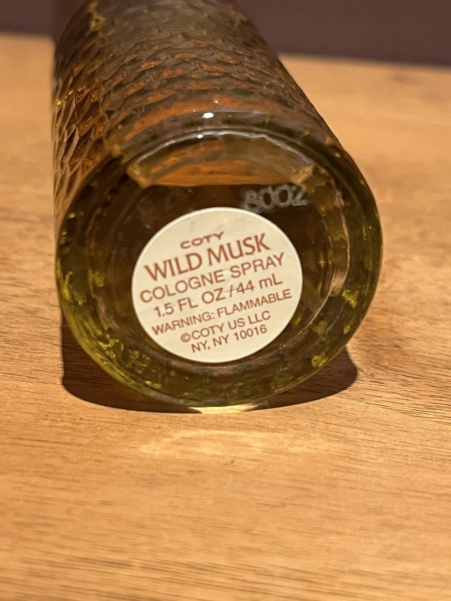 COTY WILD MUSK 1.5 FL. OZ / 44 mL COLOGNE SPRAY DIAMOND CUT BOTTLE