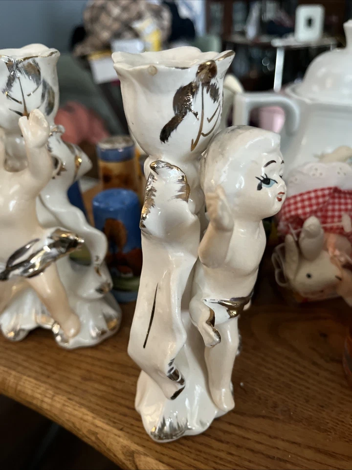 Candelabros de querubín  Foto 2 de 4