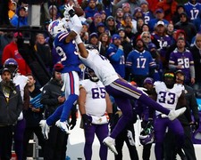 Foto de fútbol americano de la NFL Justin Jefferson captura con una mano de los Minnesota Vikings 8x10