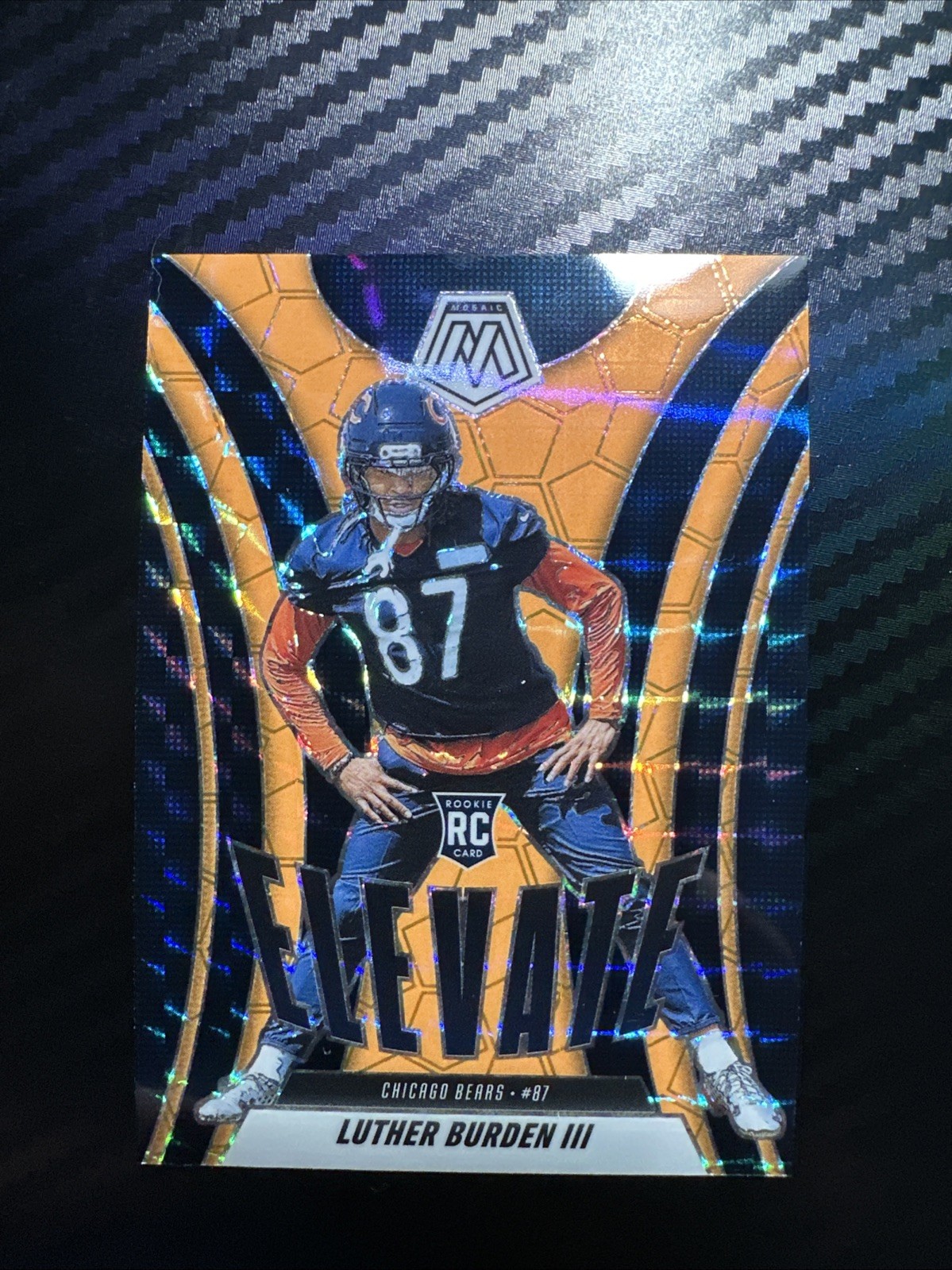 2025 Panini Mosaic - Elevate Luther Burden #7 Orange Fluorescent Mosaic Prizm A3