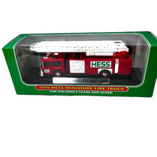 1999 HESS Miniature Ladder Red Fire Truck With Stand and SIgnage