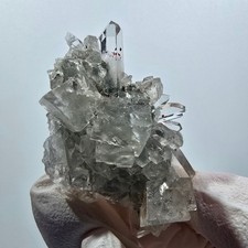 Starburst quartz with hematite and calcite on matrix, Streep Mine, Goboboseb