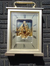 Brass Tone Howard Miller Japan Desk Carriage Skeleton Clock Battery Op