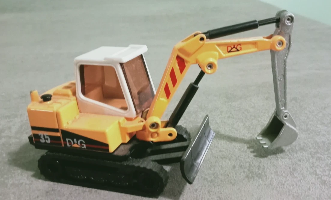 Modellino Amercom Altaya 1:64 – Trattore Caricatore Traxcavator – Costruzione In Pressofuso