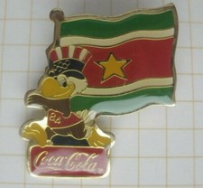 SURINAME FLAG / COCA-COLA OLYMPIA LOS ANGELES `84 MASCOT SAM ..Spange!!!(712)