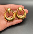 Vintage MONET Door Knocker Clip Earrings Shiny Gold Tone 1.5” Length — photo 1