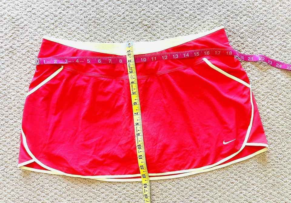 Lote de 2 faldas deportivas Nike DriFit - púrpura y rojo neón - talla XL para mujer Foto 4 de 4