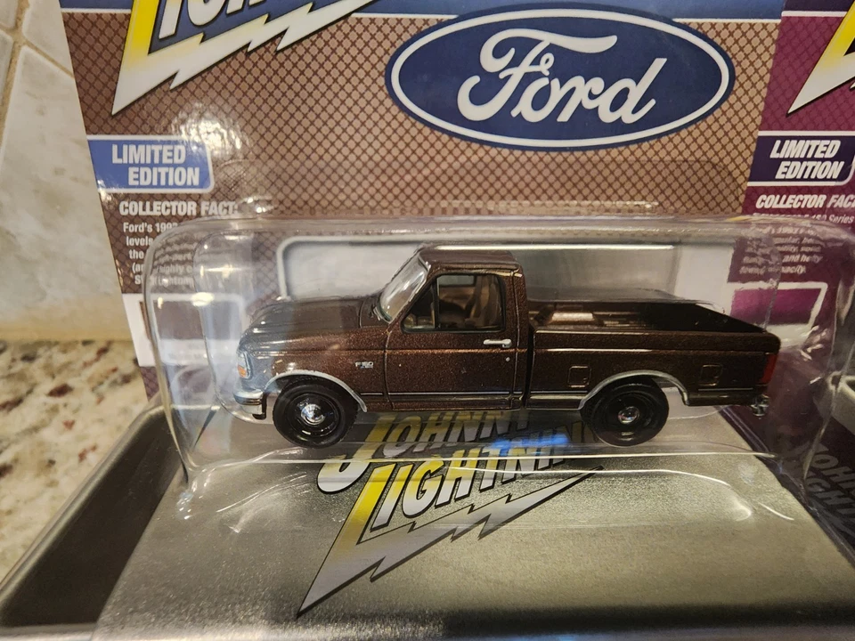 NEW 2025 JOHNNY LIGHTNING STORAGE TIN VERSION A & B 1993 FORD F-150   LOT 2 - Image 2 of 4