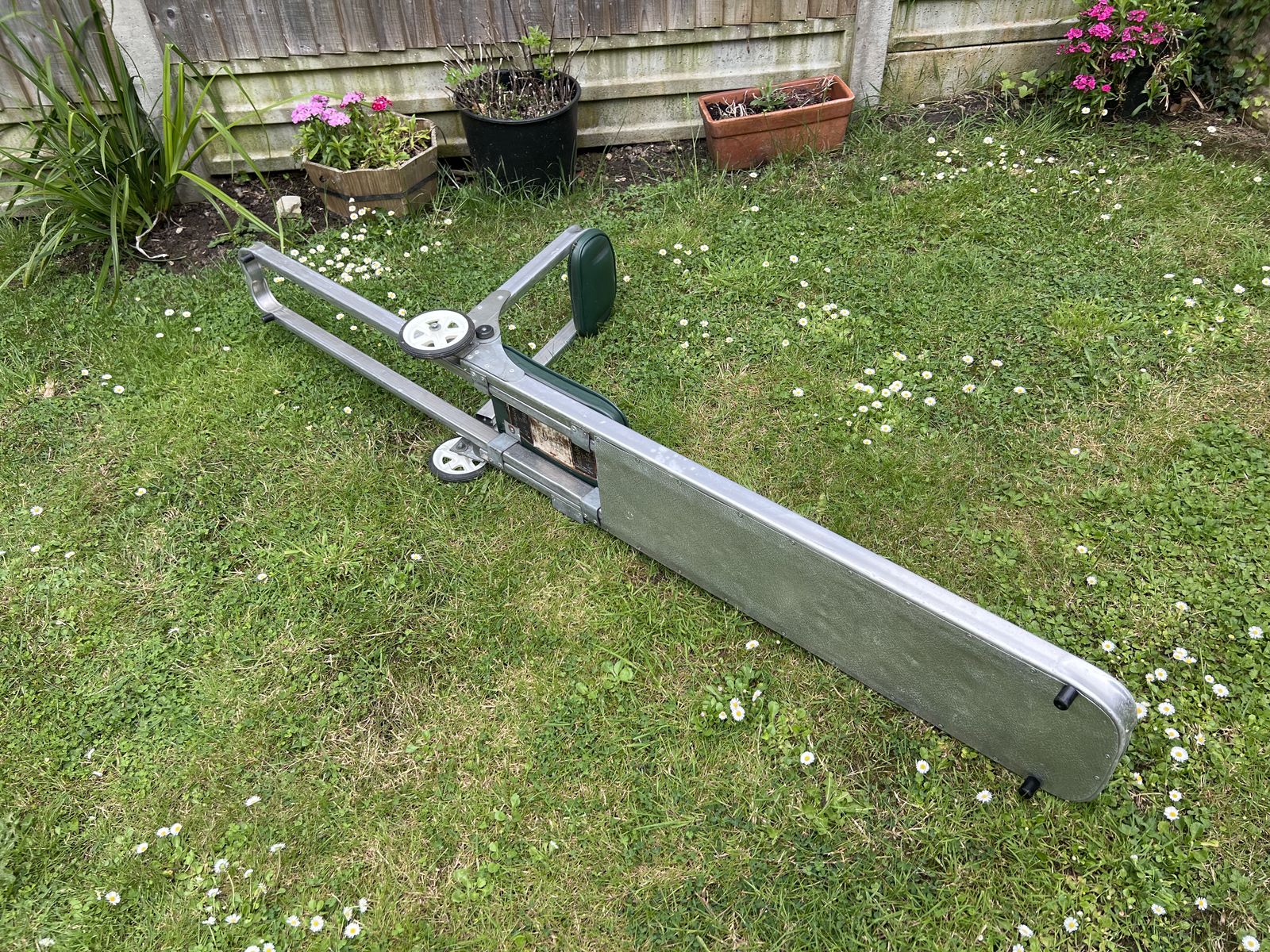 Rutland fly fishing boat seat in used condition with added wheels for