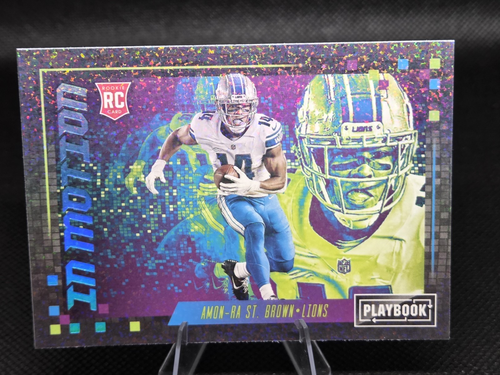 Amon-Ra St. Brown Panini Playbook in Motion #INMASB Base