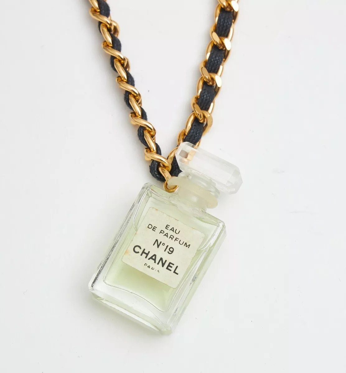 CHANEL Necklace n. 19 Eau de Parfume Pendant Glass, Gold and Black Chain