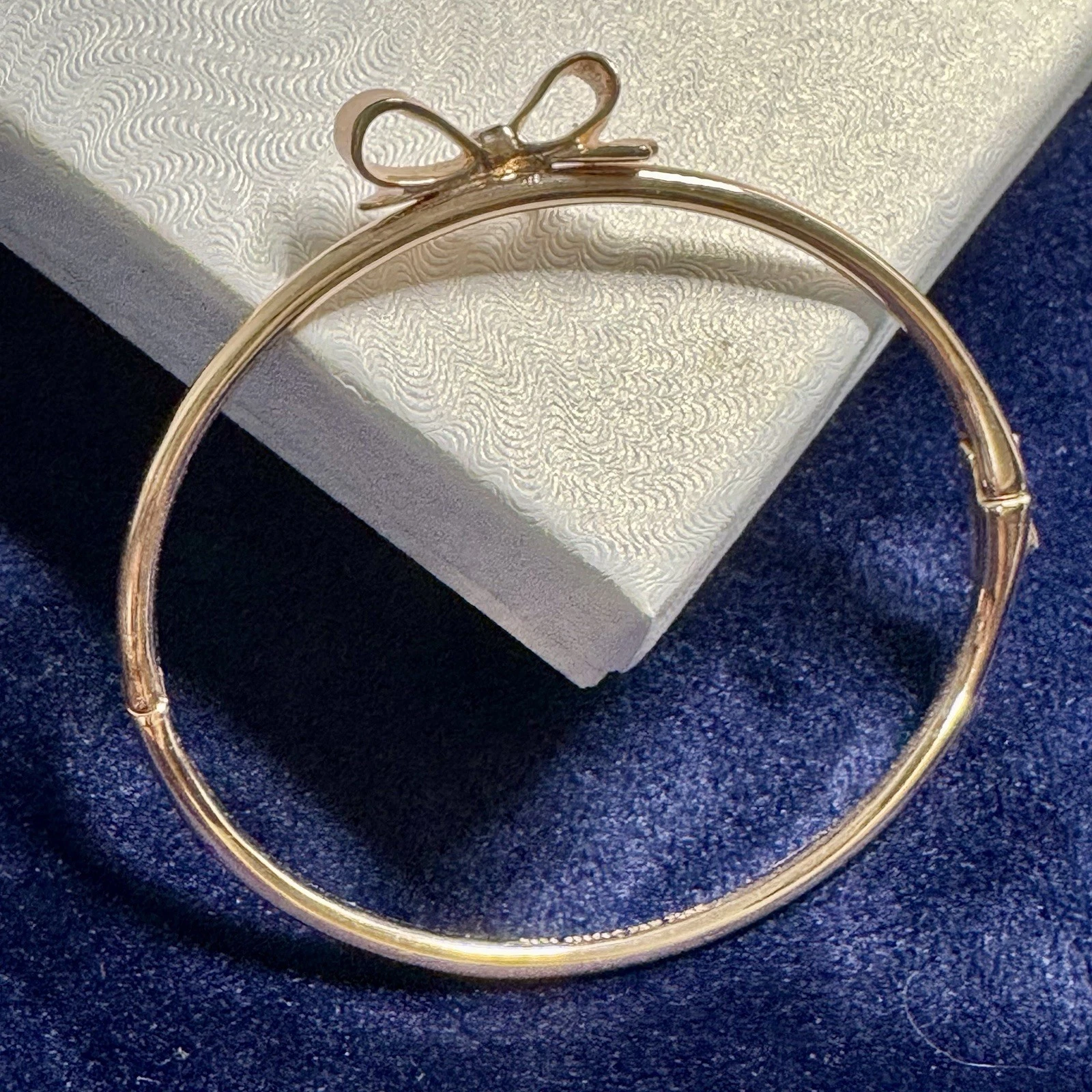 Bracciale Kate Spade New York placcato oro rosa fiocco con cerniera 6 75" include sacchetto antipolvere