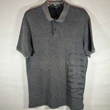 DKNY Men  s Polo Shirt Size Med in Black w/ Large DKNY Logo on Front.