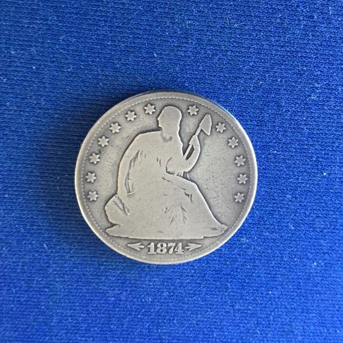 1874 W/Ar Seated Liberty Half Dollar having good details, full rims and reeding.