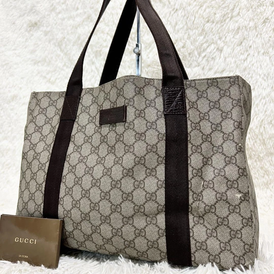 Sac fourre tout Gucci d'occasion GG Supreme A4 rangement cuir marron authentique Japon