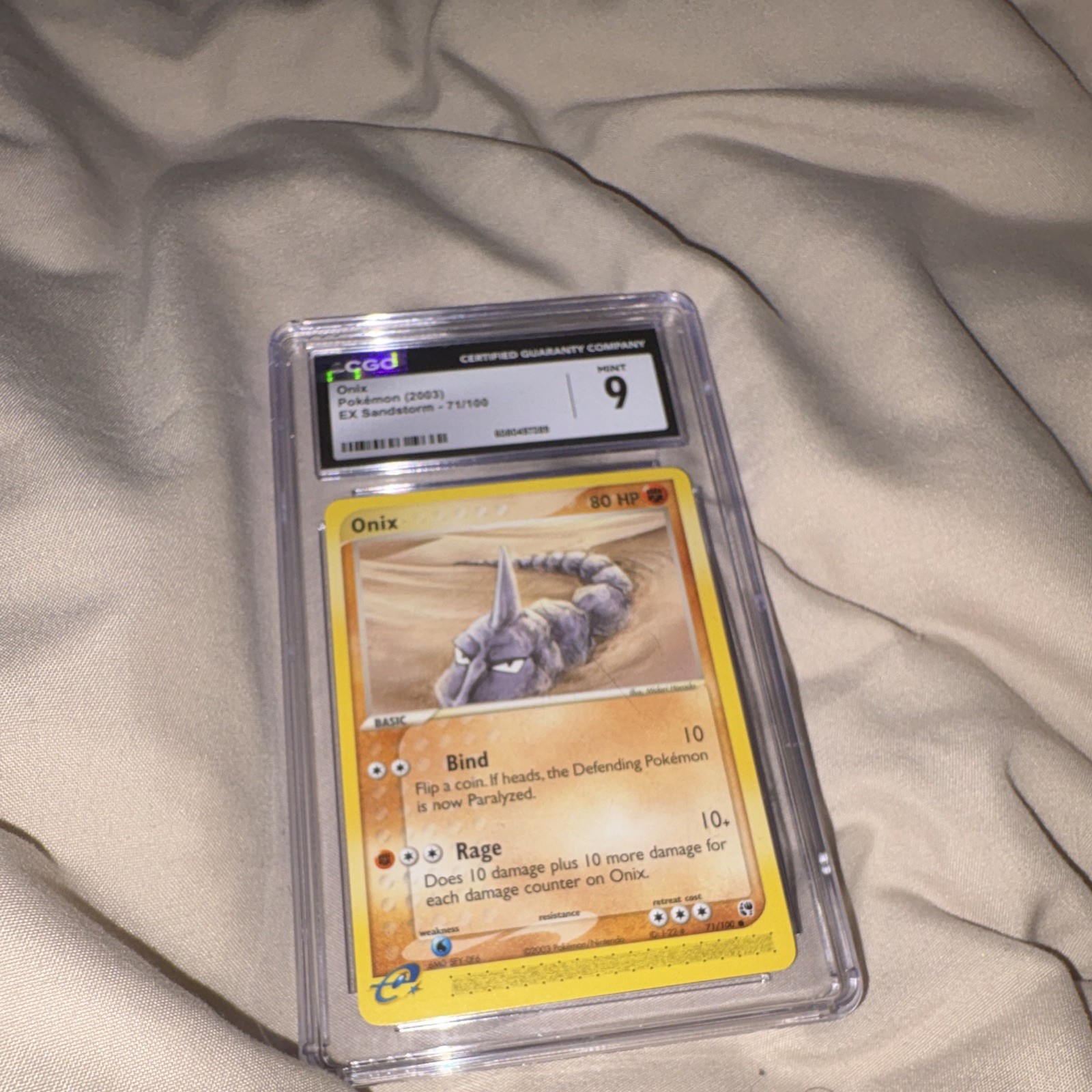 CGC 9 Mint Onix 71/100 EX Sandstorm 2003 English Pokemon TCG Card