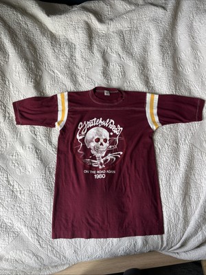 Vintage 1980 Grateful Dead On The Road Again graphic T-shirt In A Jersey Style.