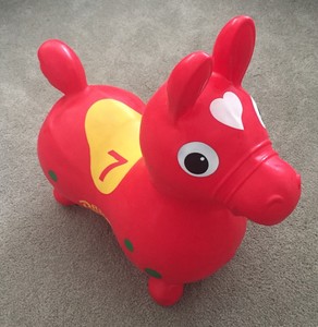 red bouncy horse