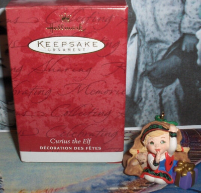 Curius The Elf`2001'She Is Stowed Away In Santa's Bag Of Toys,Hallmark Ornament