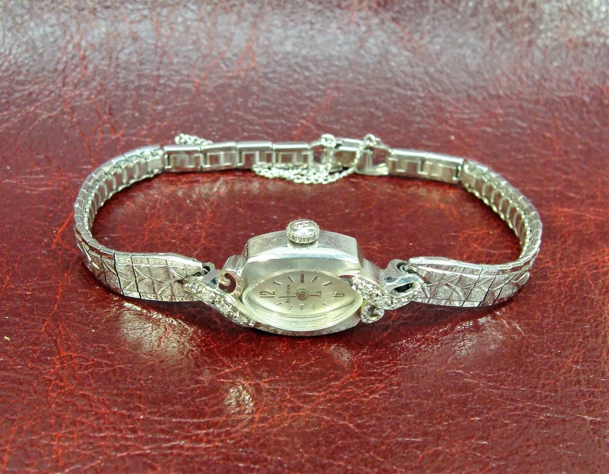 VINTAGE BULOVA 23 14k LADY S DIAMOND STUDDED WATCH