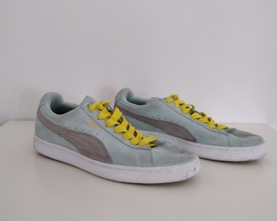 blue and yellow puma trainers