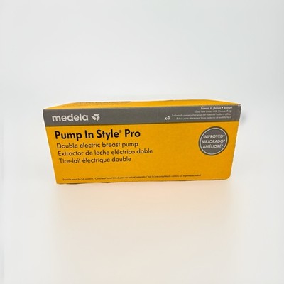 Medela Pump In Style Pro Double Electric Breast Pump w/ Bottles and flanges 