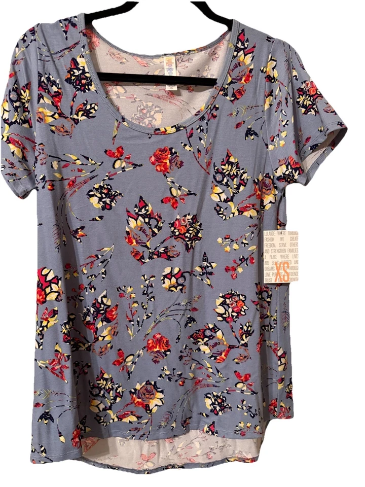 Lote - 6 Camisetas LulaRoe Clásicas XS ARTÍCULOS EXTRA INCLUIDOS Floral, Cachemira, Pixel Foto 3 de 4