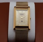Vintage Seiko Slim Quartz Men's Wrist Watch Cream  Dial with Gold Mesh Band.