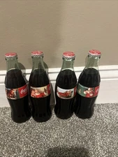 Coke Christmas Bottle Lot Of 4 Sealed Bottles