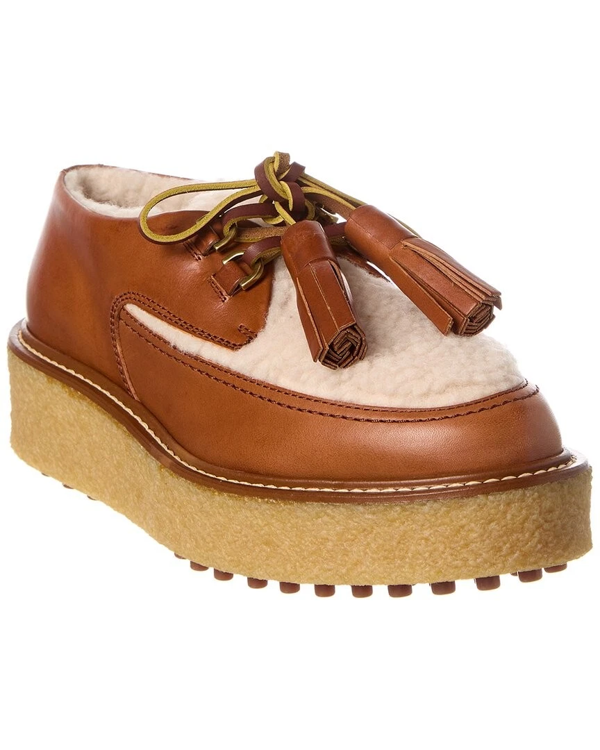 TOD’S Mocassino donna Tod's in pelle e shearling platform