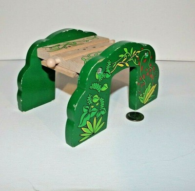 wooden train track tunnel