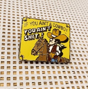 Vintage enamel pin featuring a humorous Western theme w/funny saying