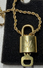 authentic louis vuitton gold lock  key 308 with 16in 14k gold plated rope chain