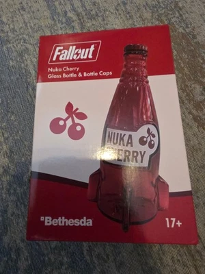 BETHESDA Fallout Nuka Cola Cherry Glass Bottle + 10 Bottle Caps Rocket Replica brand new