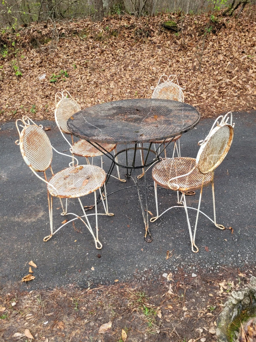White wrought iron table and chairs hot sale