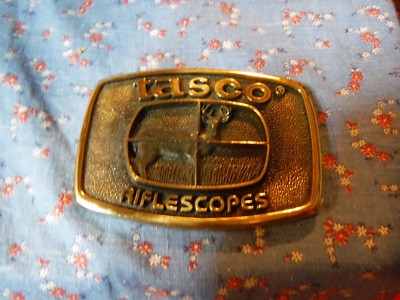 Tasco Riflescopes Paperweight Metal  3 3/8 x 2 3/8 Inches
