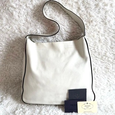 PRADA one shoulder bag leather logo embossed off white From Japan
