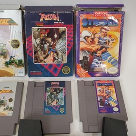 Lot of 8 NES Games Ikari Warriors II Jackal Trojan Strider Captain Comic CIB