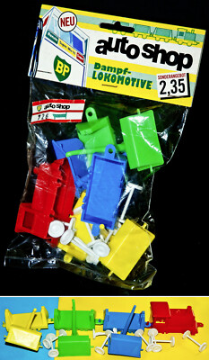JEAN HÖFLER BP autoshop DAMPF LOKOMOTVE BAUSATZ mit 3 bunten LORE WAGGONS 1970er