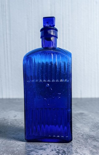 Admiralty 16 oz cobalt blue antique glass poison bottle with original stopper