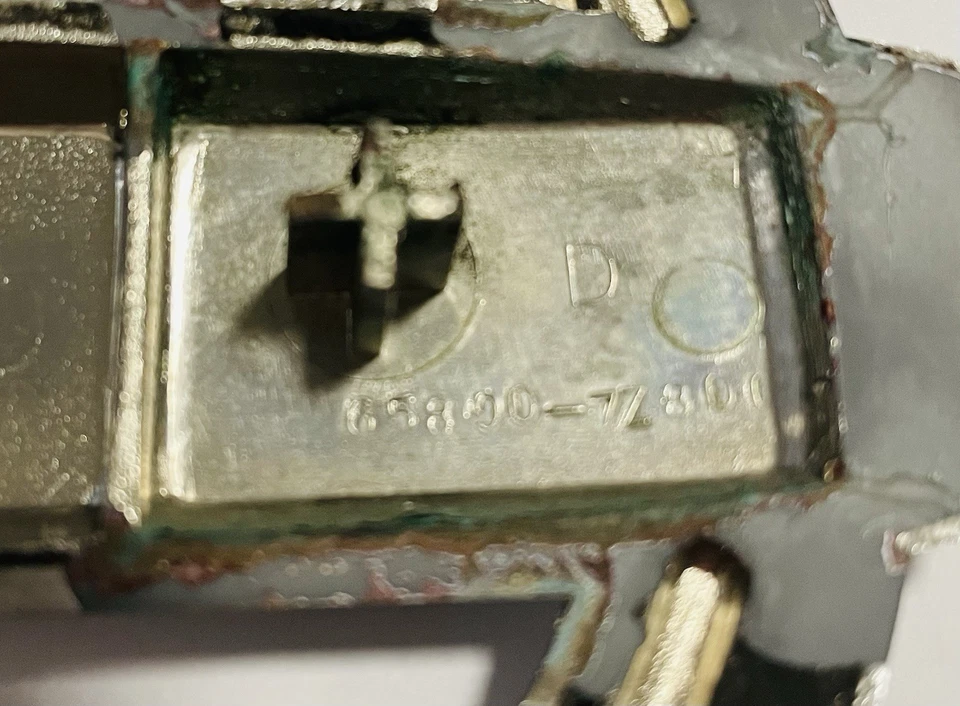 2001-2004 Nissan Xterra Front Emblem OEM  - Image 4 of 4