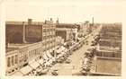 J17/ Mankato Minnesota RPPC Postcard c1930s Front Street Stores Autos 57