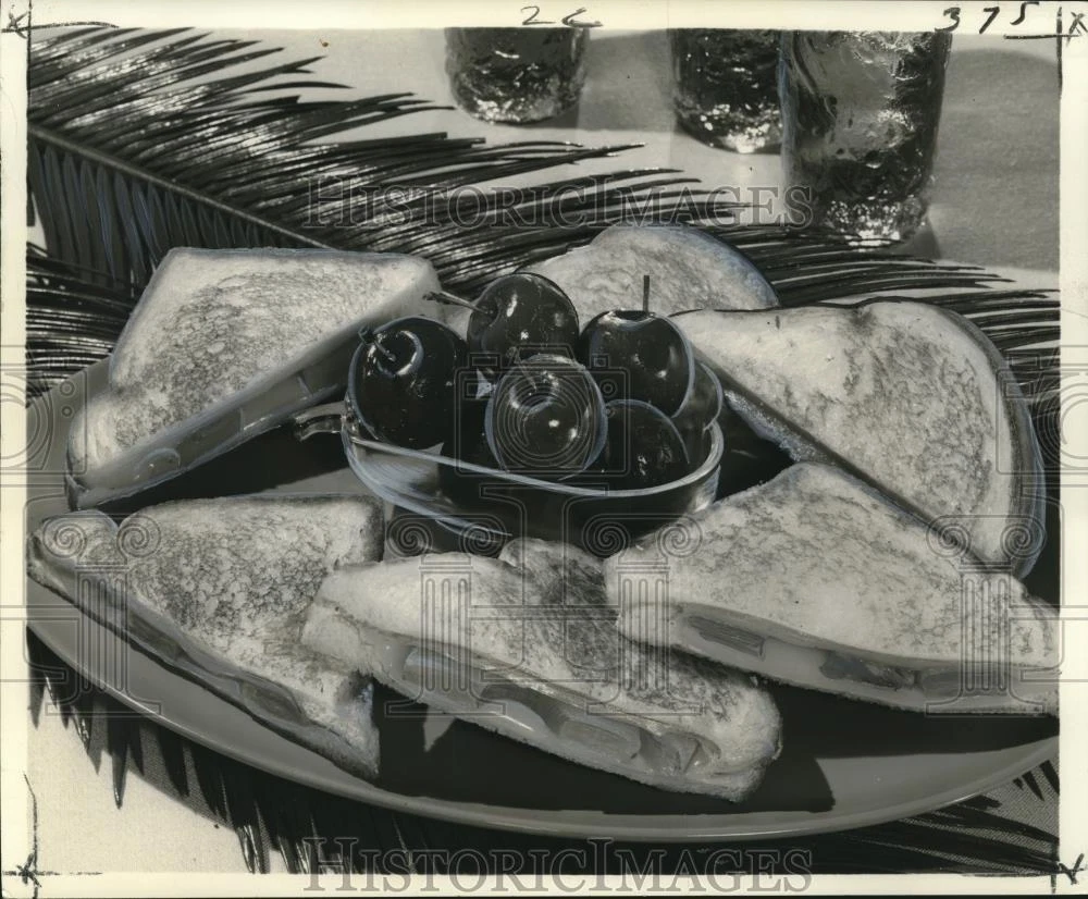 1965 Press Photo Plate of The Grand Hawaiian sandwiches with bowl of cherries